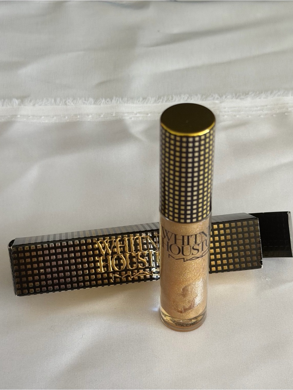MAC x Whitney Houston Lipglass – Shade "Nippy's Shimmery Gold" (Limited Edition